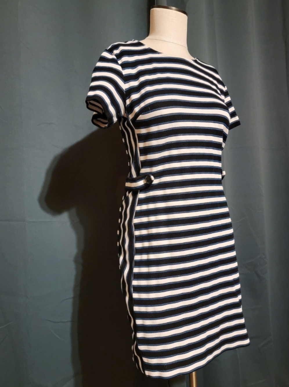 Black, white, and blue striped form fitting Banana Republic midi dress